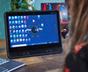 Woman using Tobii Dynavox TD Control on a TD I-Series eye gaze-enabled speech generating device